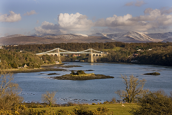 The Menai Bridge and Snowdon Mountain range.
